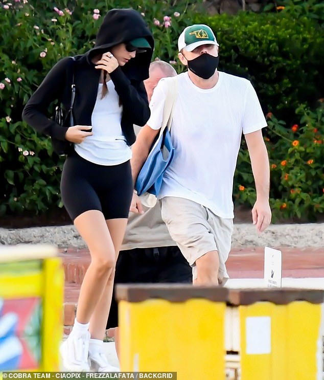 The Titanic actor opted for comfort with a short-sleeved plain white T-shirt and khaki shorts