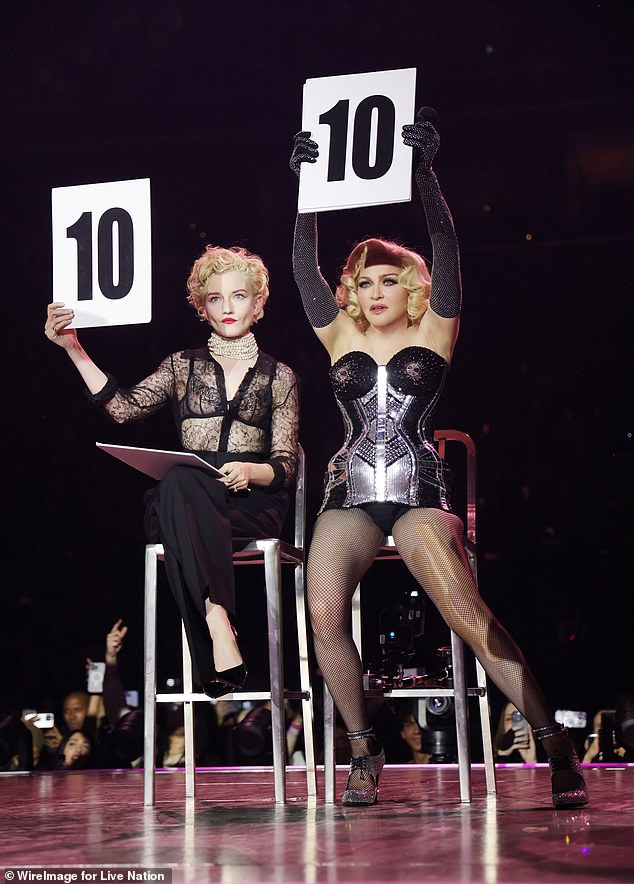 On the film's delays, Julia added: 'Anything that's great, takes a long time' (pictured with Madonna on her Celebration Tour in 2023)