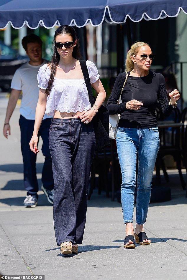 The budding chef, 26, has returned to the US with Nicola and her mother Claudia, pictured together, after narrowly avoiding a run-in with Brooklyn's family amid their ongoing rift