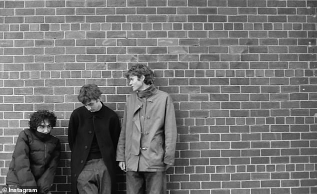 The upload included shots of him playing guitar with a microphone set in front of him, and an artsy black and white snap of the band standing in front a brick wall