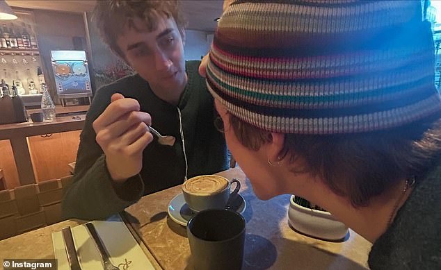 The music artist enjoyed a coffee with a friend in one picture