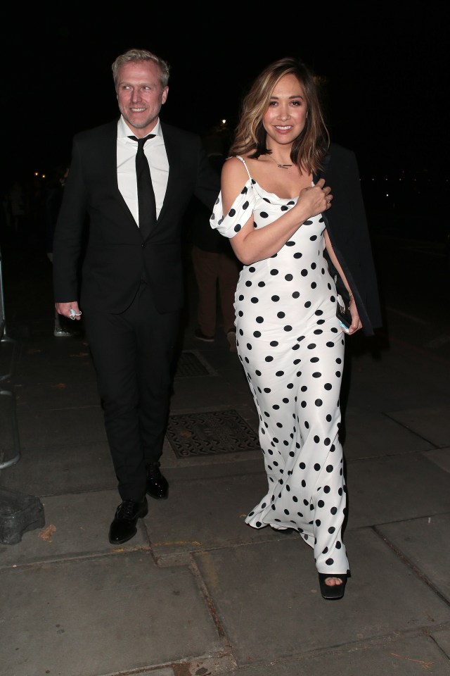 Simon Motson and Myleene Klass leaving a London venue.
