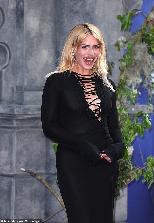 She was in high spirits as she posed for photos on the red carpet
