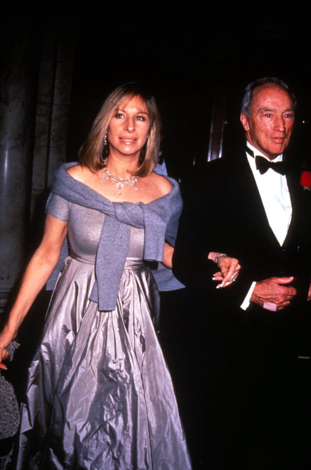 Barbra Streisand and Pierre Trudeau at an event.