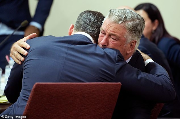 Alec Baldwin is pictured hugging his attorney Alex Spiro at the conclusion of his trial for involuntary manslaughter