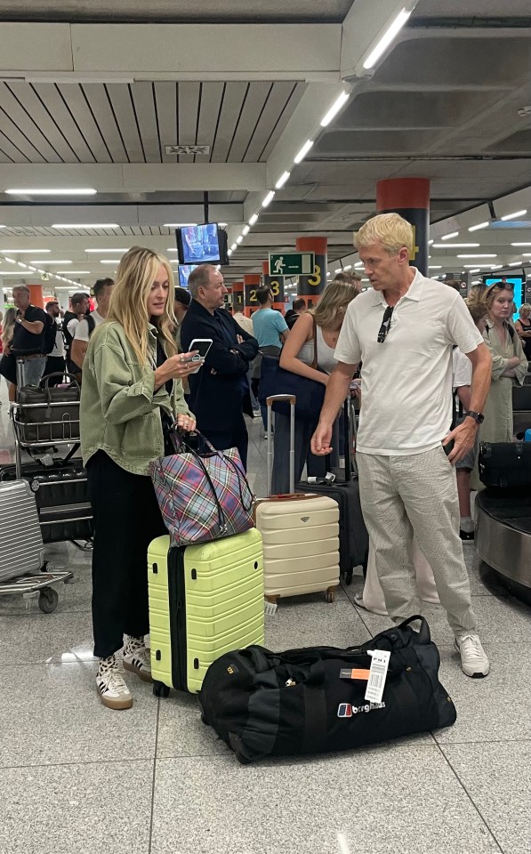 Ferne Cotton and her boyfriend at an airport.