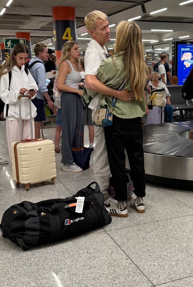 Ferne Cotton and her boyfriend at an airport.