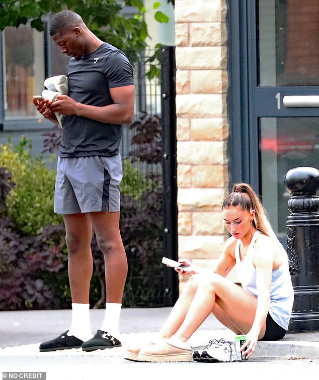Alicia also put on a pair of Ugg slippers while they waited
