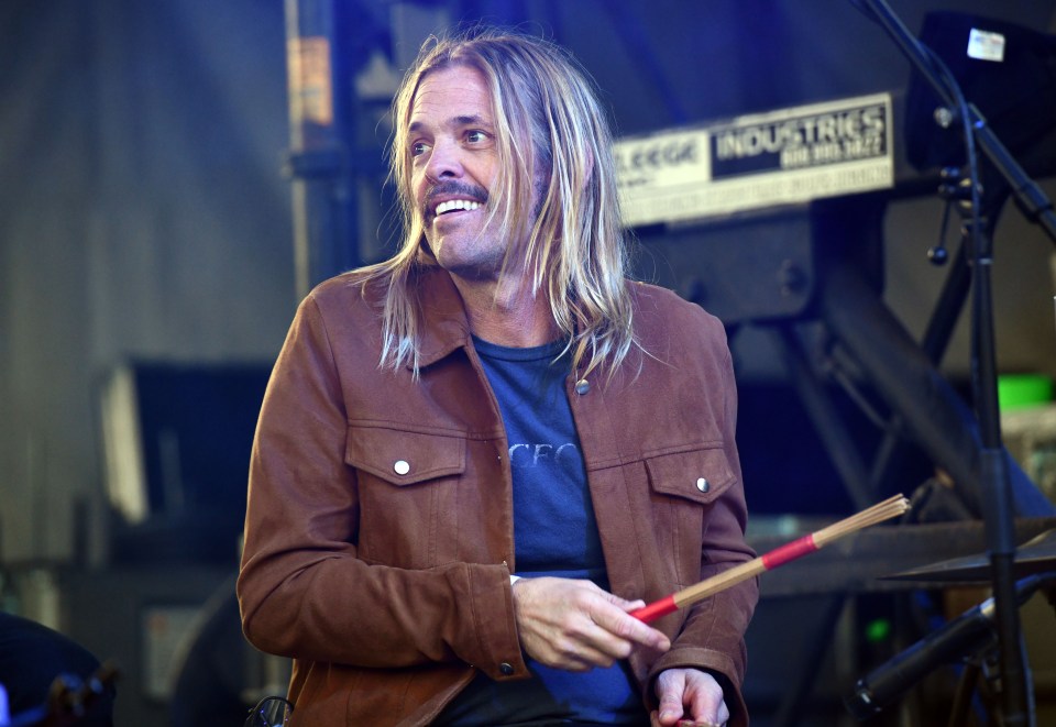 Taylor Hawkins of the Foo Fighters performing at a festival.