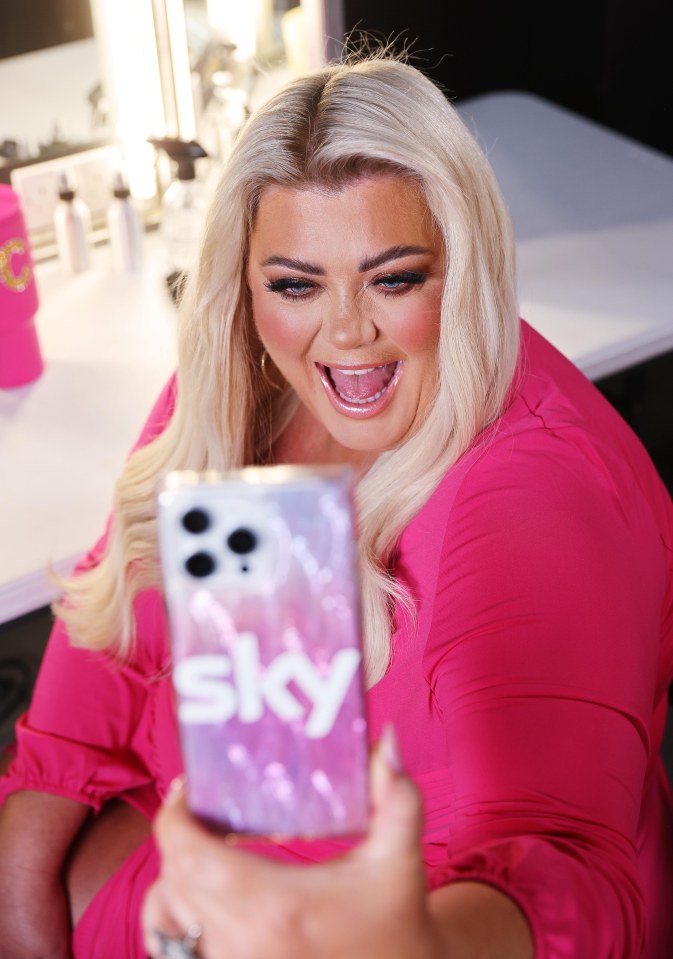 Gemma Collins taking a selfie with a Sky Mobile phone.