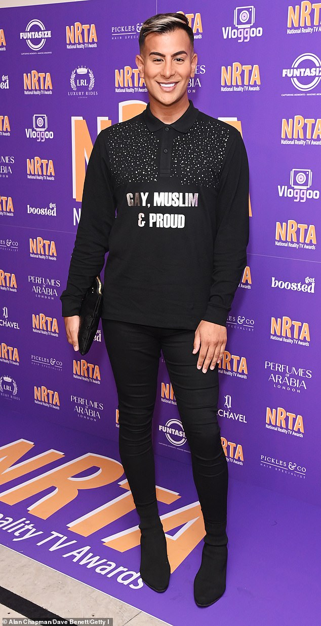 TOWIE's Junaid Ahmed ensured all eyes were on him with a bejeweled shirt which read 'Gay, Muslim & Proud'