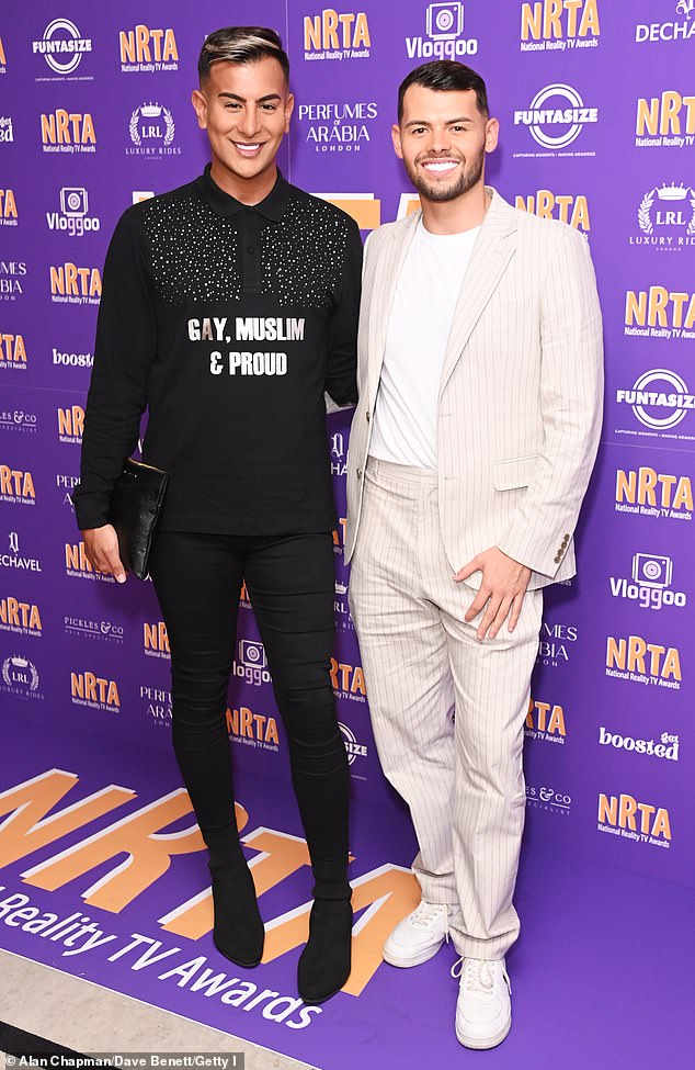 The reality star (L) was joined by handsome boyfriend Joe Blackman (R)