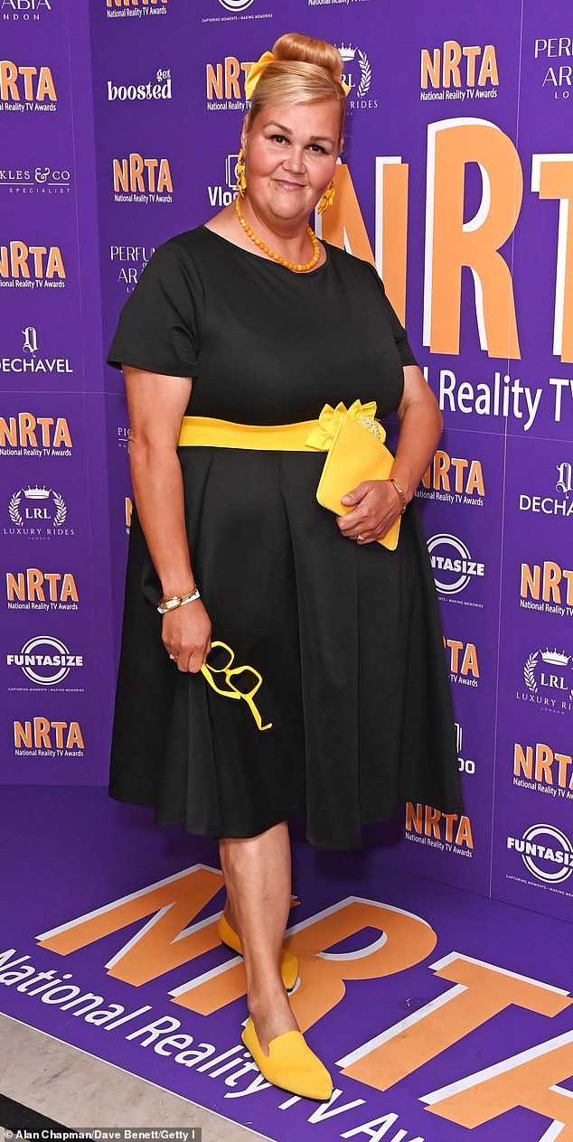 GBBO's Nelly Ghaffar looked stylish in a black dress with yellow accents