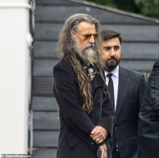 Rob Zombie (pictured) wore a black scarf with skulls on it in true Ozzy fashion