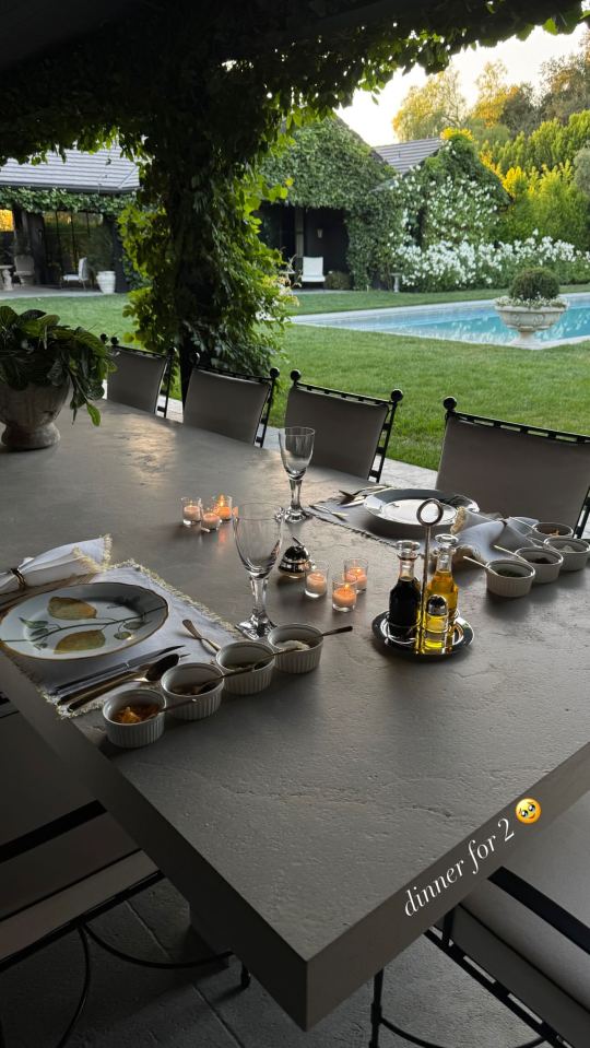 Dinner setting for two outdoors.