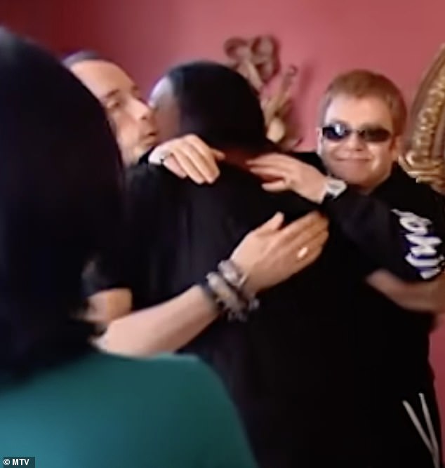 Clearly shocked by the gesture, Ozzy said: 'No! f**** off!' and said he 'felt bad' for accepting the trinket, Elton quipped: 'Don't be so stupid you silly old b******'