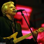 70s rock legend Dave Edmunds is fighting for his life in hospital after suffering a major cardiac arrest, his wife has revealed (pictured in 2014)