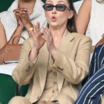 Adolescence star Erin Doherty, 32, put on a very animated display as she watched the Women's Singles at Wimbledon 's centre court on Sunday