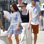 Ashton Kutcher (R) sparked concern wearing a wrist guard while boarding a yacht called Eminence alongside his second wife Mila Kunis (L) during their 10th wedding anniversary trip to Venice, Italy on Thursday