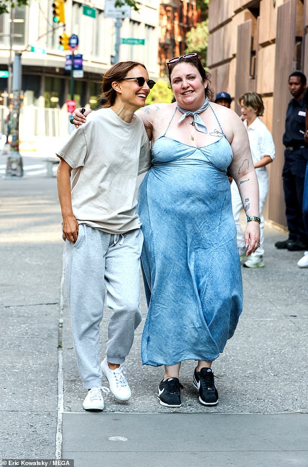 Lena Dunham (R) excitedly embraced Natalie Portman (L), whom she teamed up with to co-produce her new Netflix rom-com Good Sex, in Manhattan's East Village on Monday