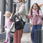 Carrie Bickmore has headed off for a getaway with her two daughters. All pictured