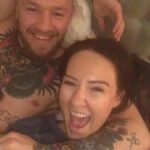 Conor McGregor's fiancee has spoken out after the sportsman was pictured kissing a mystery woman, reposting photos of the couple together to mark his 37th birthday on Monday