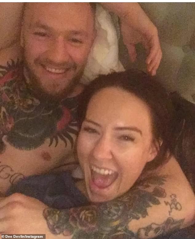 Conor McGregor's fiancee has spoken out after the sportsman was pictured kissing a mystery woman, reposting photos of the couple together to mark his 37th birthday on Monday