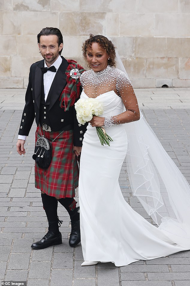 Speaking exclusively to Daily Mail Australia, Hughes revealed there were a few unexpected moments inside the ceremony that didn't make it to social media. Mel is pictured at her wedding with Rory McPhee