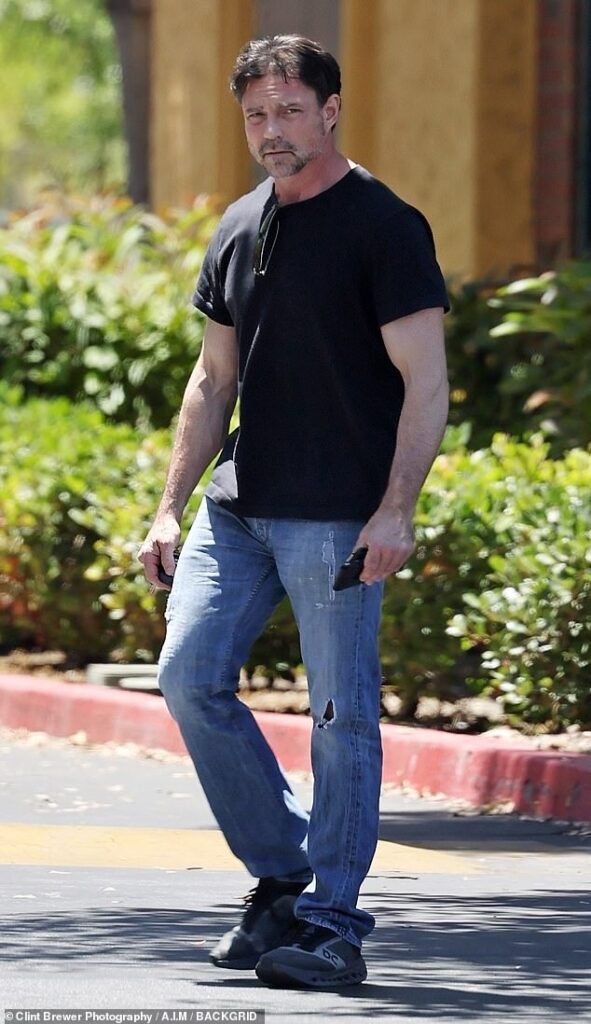 Denise Richards' estranged husband Aaron Phypers was spotted out in Los Angeles on Thursday, days after he filed for divorce