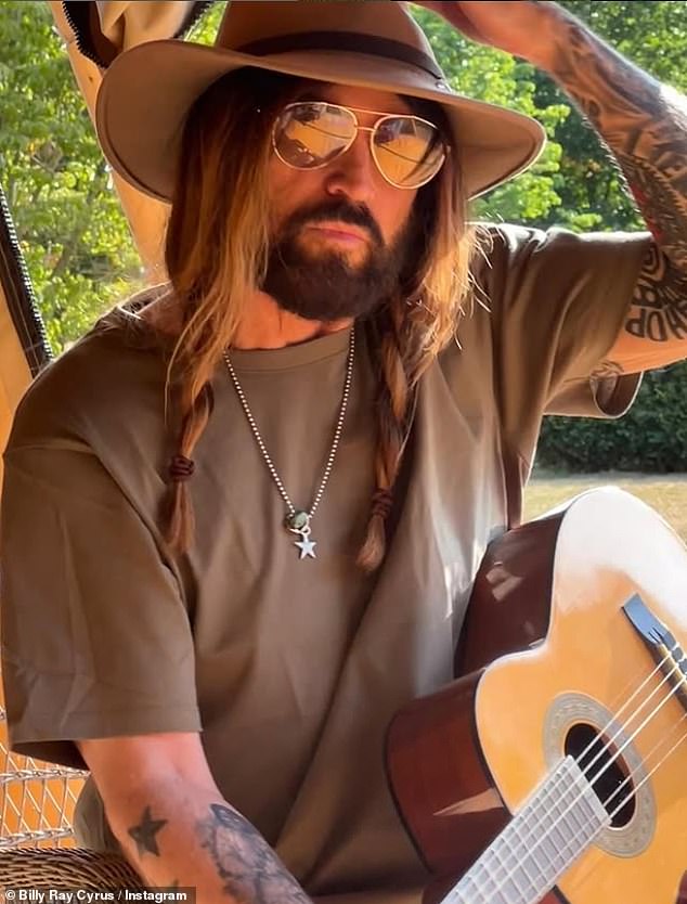 Elizabeth Hurley's romance with Billy Ray Cyrus is hotting up as he took to Instagram on Monday to reveal he is spending his first UK summer at her £6m country pile in Herefordshire