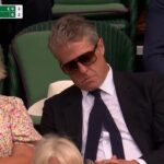 The excitement of the Wimbledon quarter-finals was too much for Hugh Grant , as he appeared to fall asleep while on camera in the Royal Box