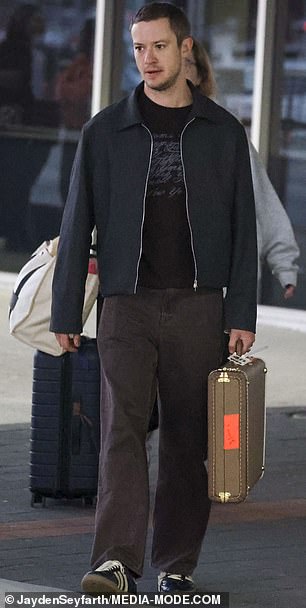 Pedro Pascal , Joseph Quinn (pictured) and Vanessa Kirby were spotted making their way through Sydney Airport, looking relaxed yet camera-ready as they landed in Australia