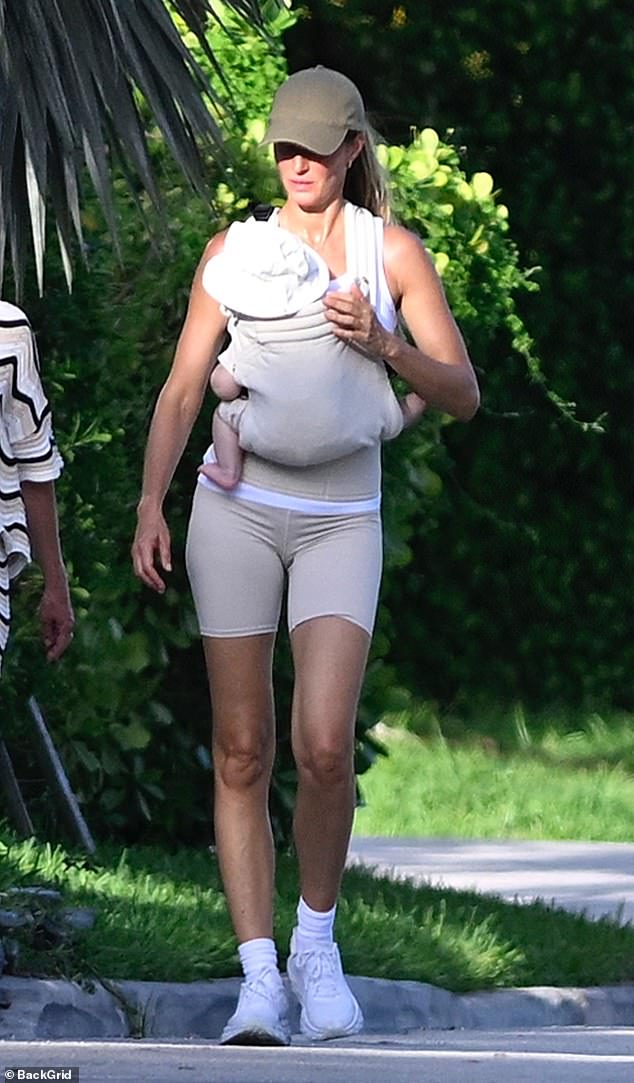 Gisele Bündchen was spotted on a rare outing with her baby on Friday as the two strolled around their neighborhood in Surfside, Florida