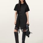 Holly Willoughby's gothic Glastonbury look is a sell-out with self-designed hiking boots and belted mini dress - as her festival fashion wows style-stealing fans