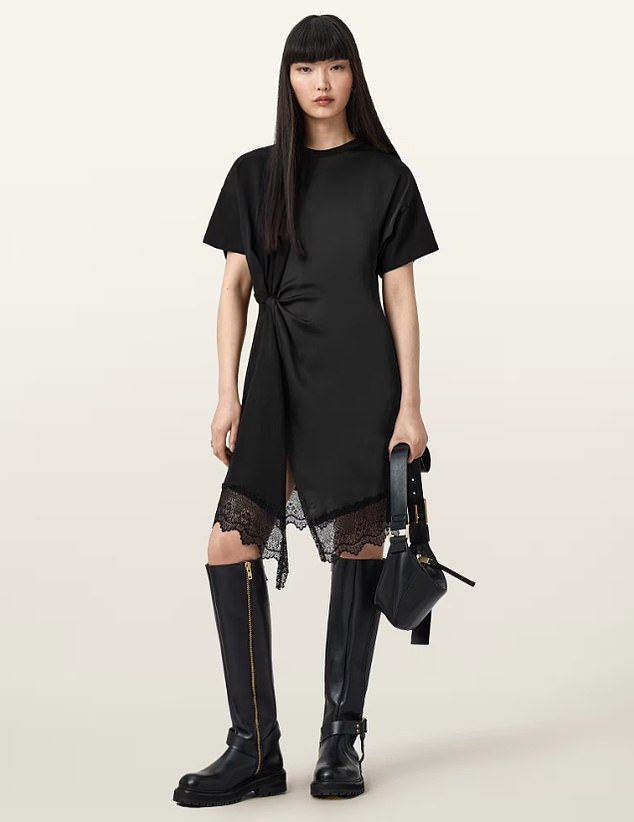 Holly Willoughby's gothic Glastonbury look is a sell-out with self-designed hiking boots and belted mini dress - as her festival fashion wows style-stealing fans