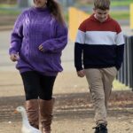 Home and Away star Christie Hayes shows off her baby bump during a stroll with her son in Tasmania