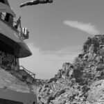 Jason Statham proved he's still got it as recreated his Commonwealth Games dive off his luxury yacht while on a family holiday in Positano in Italy