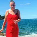 Jelena Dokic ensured all eyes were on her on Monday when she flaunted her slimmed-down frame in Croatia. In one image, Jelena was all smiles as she posed in a ruby red summer frock that featured strappy sleeves and a midi-length skirt. Pictured