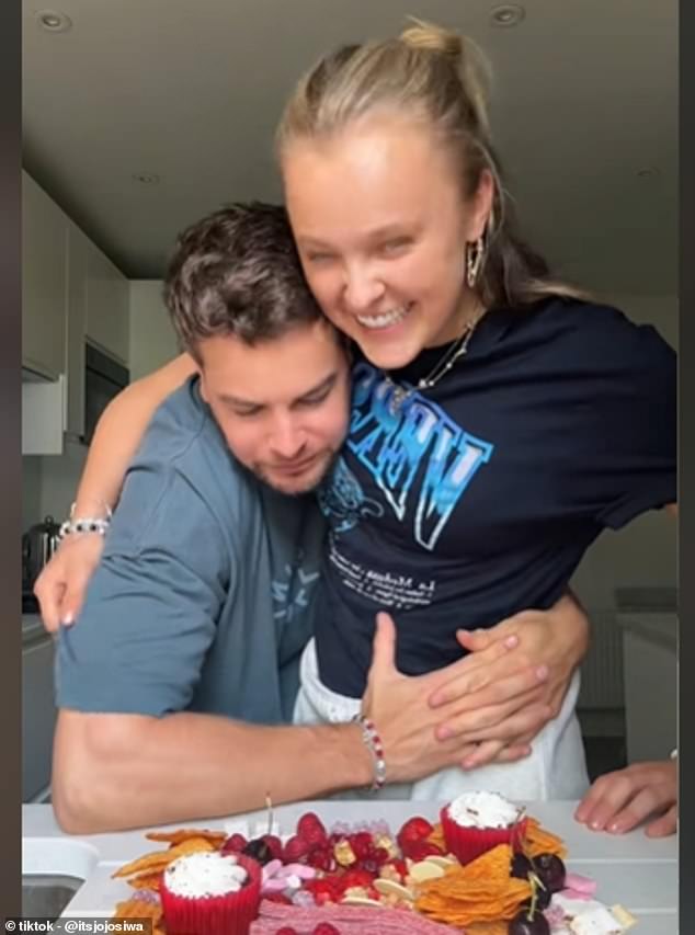 JoJo Siwa and Chris Hughes sparked pregnancy rumors with a viral TikTok in which he was seen gently rubbing her tummy