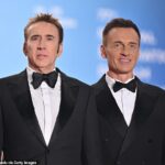 Beloved Australian actor Julian McMahon has p[assed away, aged 56. Pictured with The Surfer co-star Nicholas Cage in May 2024
