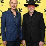 Julian McMahon (left) has been fondly remembered by Nicolas Cage, his co-star in the new film The Surfer, which they are pictured promoting at SXSW this March