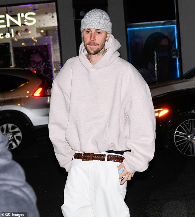 Justin Bieber 's fans have been left outraged by the 'ridiculous' prices he's charging for his new clothing line, SKYLRK — which features a $200 pair of sunglasses; seen in February