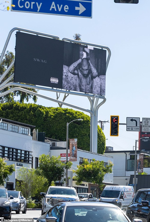 On Thursday he teased fans with his return to music with billboards with 'Swag' on them in major cities throughout North America