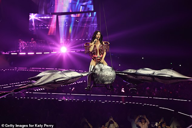 Fans were left panicked as they captured the heart-stopping moment as the singer, 40, belted out her hit song Roar while soaring through the sky on a mechanical butterfly [Katy pictured on a mechanical butterfly during her tour in April]