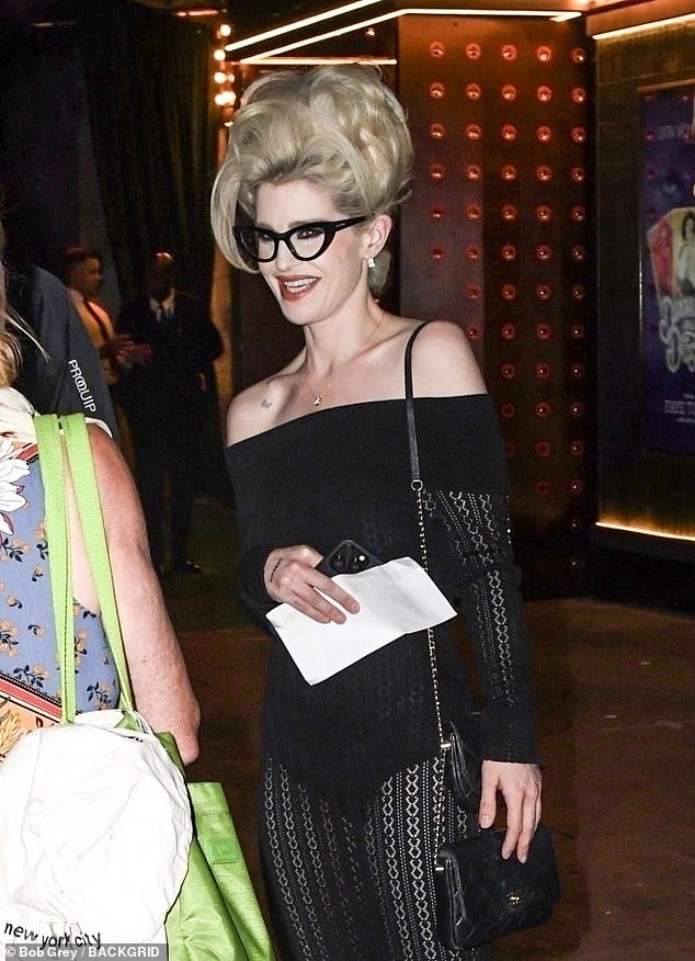 Kelly Osbourne showcased her slender frame in a knitted dress and sported a voluminous blonde beehive as she attended the Diamonds and Dust gala
