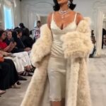 Kim Kardashian is being roundly trolled for her awkward runway walk, with fans sniggering that she looked 'drunk' or 'like a tired toddler'