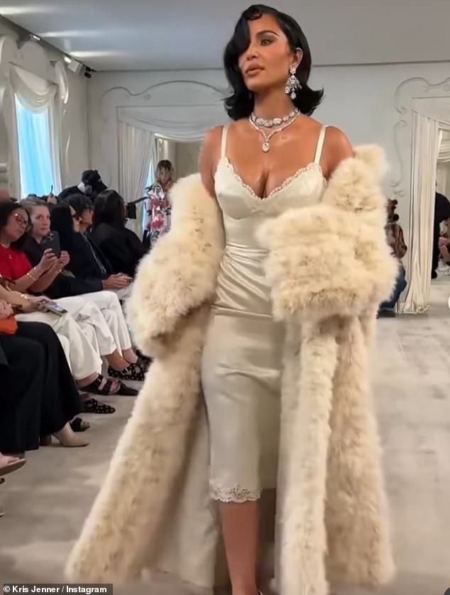 Kim Kardashian is being roundly trolled for her awkward runway walk, with fans sniggering that she looked 'drunk' or 'like a tired toddler'