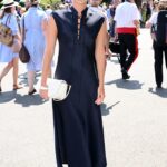 Lila Moss cut a sophisticated figure in a navy dress as she arrived at the All England Lawn Tennis and Croquet Club on Sunday for day 14 of Wimbledon