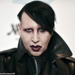 Marilyn Manson (pictured in December 2019) sparked controversy as he appeared at Black Sabbath's farewell concert on Saturday night