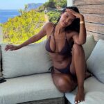 Maya Jama, 30, flaunted her jaw-dropping figure in a tiny bikini before sharing a steamy kiss with boyfriend Ruben Dias amid their sun-soaked Ibiza getaway on Saturday